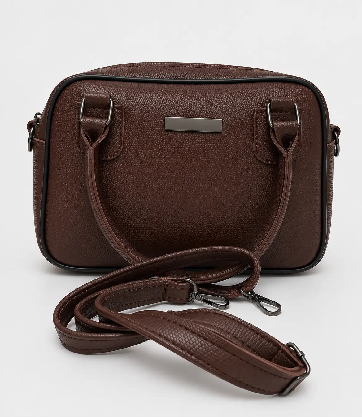 A dark brown textured faux-leather shoulder bag with dual top handles and a matching detachable shoulder strap, displayed on a light gray background.