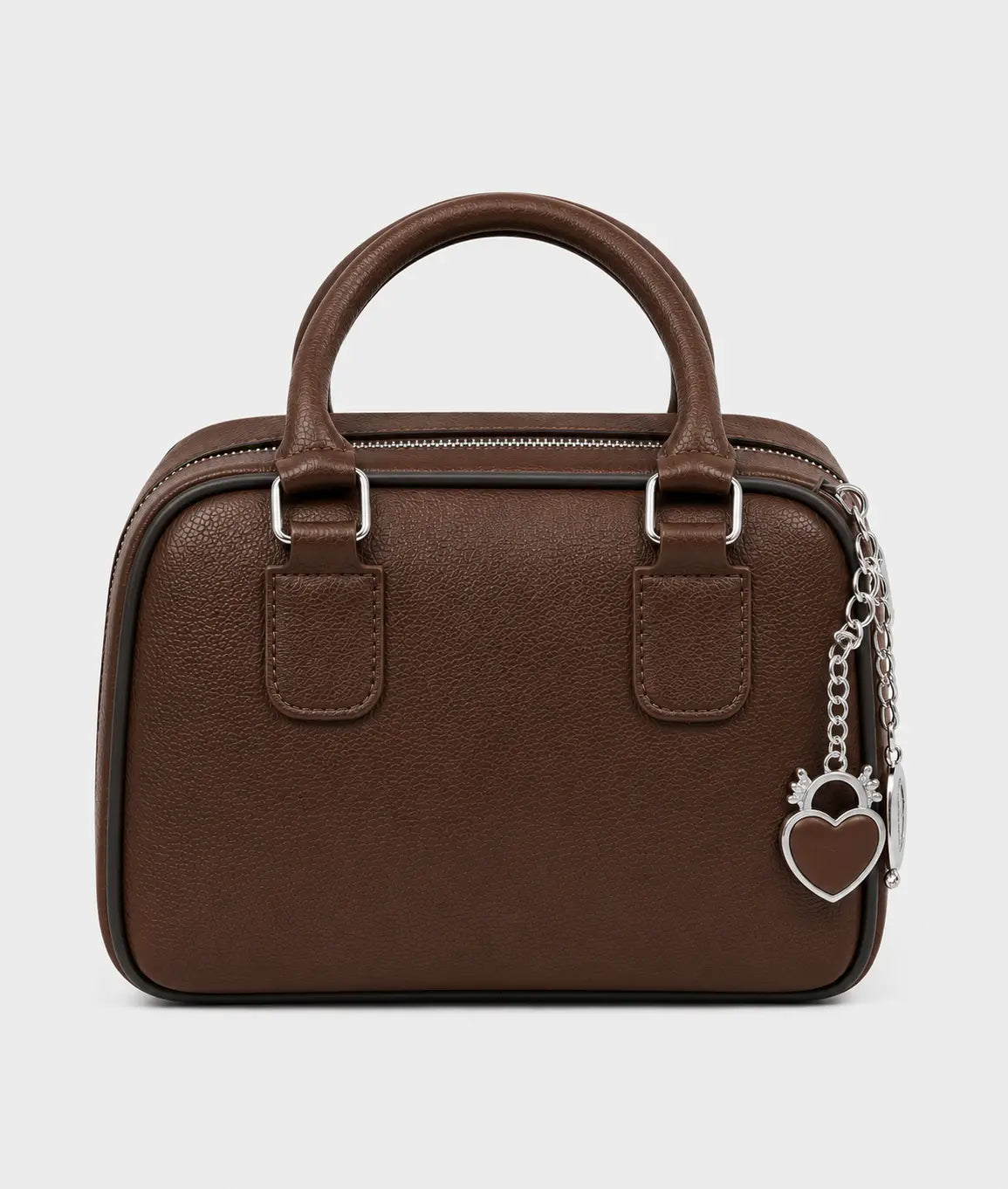 A brown textured leather handbag with a top handle, silver-tone hardware, and a dangling heart-shaped padlock charm on a chain, shown against a plain light gray background.