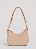 A light beige leather crescent-shaped shoulder bag with gold-tone hardware and a matching adjustable shoulder strap, shown against a neutral light gray background.